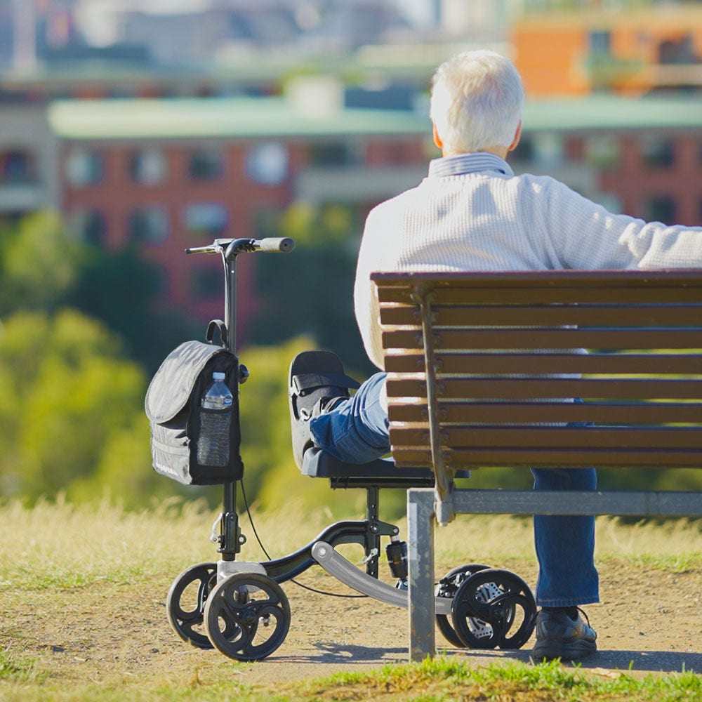 Lightweight foldable rollator with adjustable handles, suspension, and puncture-proof wheels for injury recovery