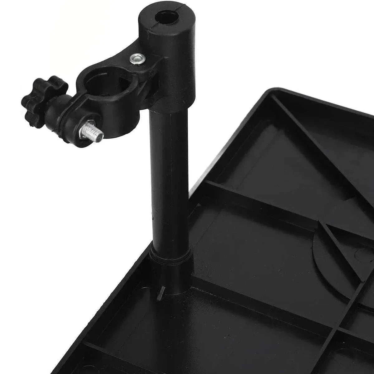 Plastic dining table tray with cup holders and textured surface attached to wheelchair for elderly mobility use