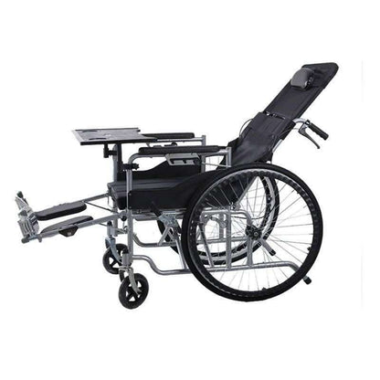 Plastic dining table tray with cup holders and textured surface attached to wheelchair for elderly mobility use