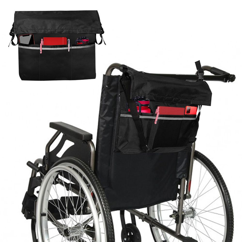 Lightweight waterproof wheelchair bag with reflective stripe hanging on back of wheelchair
