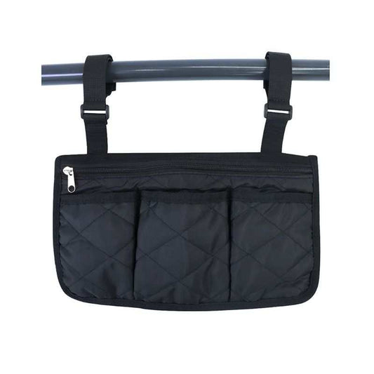 Black wheelchair side bag with 4 pockets hanging on wheelchair armrest